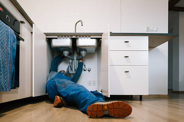 Professional Drain Cleaning technician working in Norwell, MA